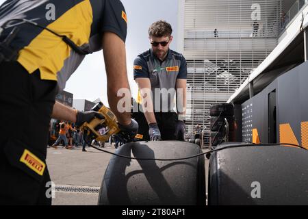 Pirelli’s engineers scrape down the tyres, marking each one by driver number and location of the tyre (front, rear, left or right) and collect data about the wear of the tyre that they then share with that team and the FIA, Mexican City Grand Prix, Mexico, 27 October 2023.  Each team is allocated one Pirelli engineer who can make suggestions based on the wear of the tyres.  Pirelli had one female track engineer at the Mexico City race, Mrs Monica Cuadrado, allocated to the Alpha Tauri team.    After the race in Qatar, the team noticed significant wear on one of the wheels, caused by pyramid cu Stock Photo