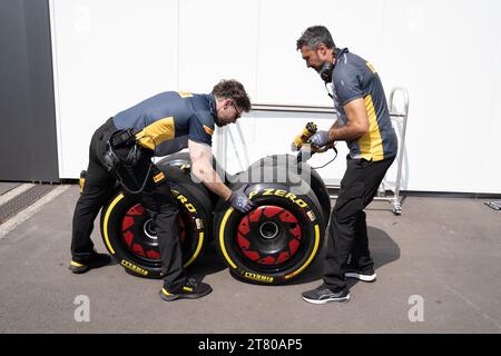 Pirelli’s engineers scrape down the tyres, marking each one by driver number and location of the tyre (front, rear, left or right) and collect data about the wear of the tyre that they then share with that team and the FIA, Mexican City Grand Prix, Mexico, 27 October 2023.  Each team is allocated one Pirelli engineer who can make suggestions based on the wear of the tyres.  Pirelli had one female track engineer at the Mexico City race, Mrs Monica Cuadrado, allocated to the Alpha Tauri team.    After the race in Qatar, the team noticed significant wear on one of the wheels, caused by pyramid cu Stock Photo