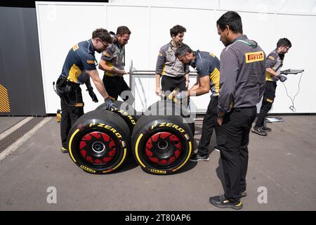 Pirelli’s engineers scrape down the tyres, marking each one by driver number and location of the tyre (front, rear, left or right) and collect data about the wear of the tyre that they then share with that team and the FIA, Mexican City Grand Prix, Mexico, 27 October 2023.  Each team is allocated one Pirelli engineer who can make suggestions based on the wear of the tyres.  Pirelli had one female track engineer at the Mexico City race, Mrs Monica Cuadrado, allocated to the Alpha Tauri team.    After the race in Qatar, the team noticed significant wear on one of the wheels, caused by pyramid cu Stock Photo