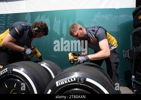 Pirelli’s engineers scrape down the tyres, marking each one by driver number and location of the tyre (front, rear, left or right) and collect data about the wear of the tyre that they then share with that team and the FIA, Mexican City Grand Prix, Mexico, 27 October 2023.  Each team is allocated one Pirelli engineer who can make suggestions based on the wear of the tyres.  Pirelli had one female track engineer at the Mexico City race, Mrs Monica Cuadrado, allocated to the Alpha Tauri team.    After the race in Qatar, the team noticed significant wear on one of the wheels, caused by pyramid cu Stock Photo