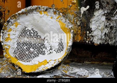 White paint oozing with mixed colours abstract Stock Photo