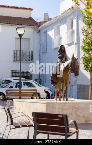 SERON, SPAIN - 05 NOVEMBER 2023 A bronze monument called The Bride of Seron depicting a bride on a horse that was to take her to the town of Baza to m Stock Photo