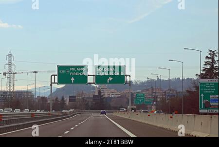 Italian highways with road signs to reach some locations in Italy Stock Photo