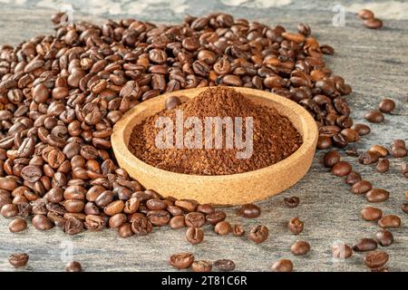 Coffee theme. Cork saucer filled with ground coffee granules. Stock Photo