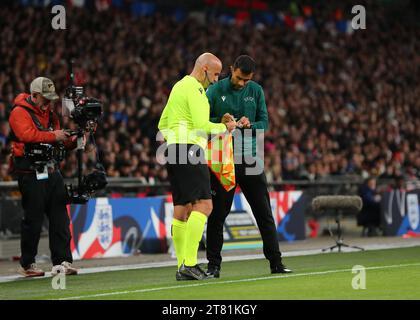 Wembley Stadium, London, UK. 17th Nov, 2023. UEFA Euro 2024 Qualifying Football, England versus Malta; UEFA official taping up the linesmen flag during the 2nd half Credit: Action Plus Sports/Alamy Live News Stock Photo