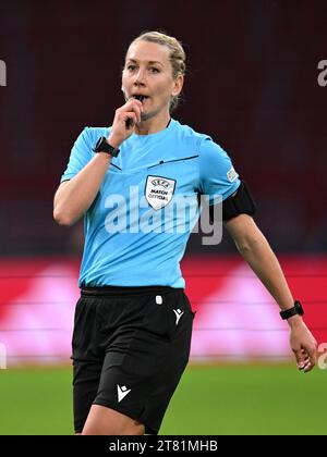 AMSTERDAM - Referee Tess Olofsson during the UEFA Women's Champions League Group C match between Ajax Amsterdam and Paris Saint Germain at the Johan Cruijff ArenA on November 15, 2023 in Amsterdam, Netherlands. ANP | Hollandse Hoogte | GERRIT VAN COLOGNE Stock Photo