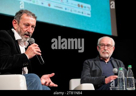 Cuneo, Italy. November 17, 2023. The journalist and writer Michele Serra together with the satirical designer and cartoonist Altan at the presentation of their recently published book at the Scrittorincittà National Literary Festival. Credit: Luca Prestia / Alamy Live News Stock Photo