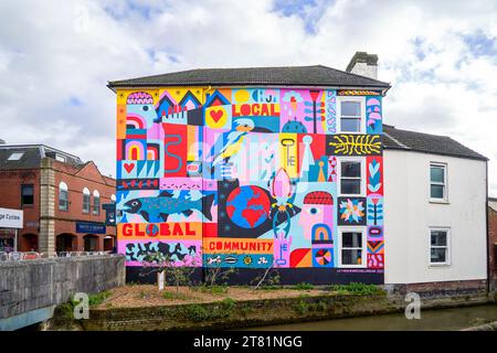 Colourful mural painted on the side of a building Stock Photo