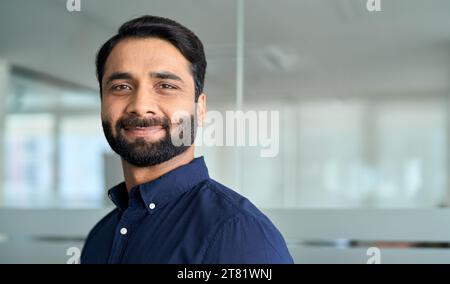 Confident Indian business man looking at camera, headshot face portrait. Stock Photo