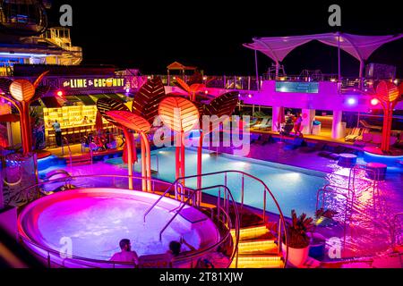 Pool deck of Royal Caribbean's Odyssey of the Seas at night. Stock Photo