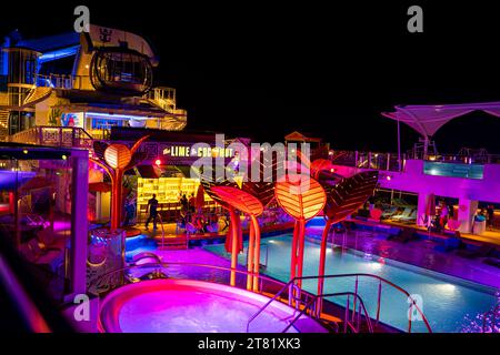 Pool deck of Royal Caribbean's Odyssey of the Seas at night. Stock Photo