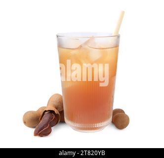 Glass of tamarind juice and fresh fruits isolated on white Stock Photo