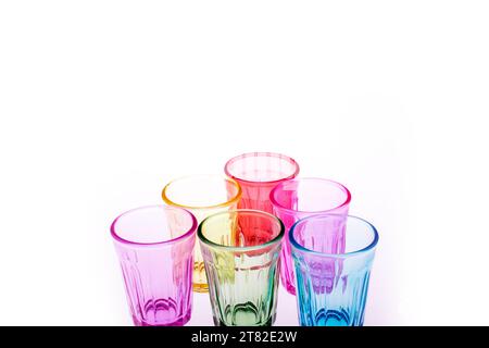 Colorful drinking glasses on white background Stock Photo