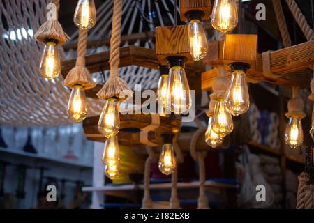 Decorative antique edison style filament light bulbs hanging Stock Photo