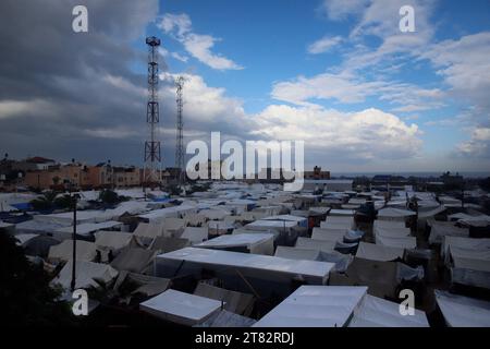 Khan Younis, Palestine. 15th Nov, 2023. A view of makeshift shelters and tents set up by internally displaced Palestinians who fled from the Israeli bombardment of the northern Gaza Strip are pictured in Khan Younis, in the southern Gaza Strip on November 15, 2023. According to the UN Relief and Works Agency for Palestine Refugees in the Near East (UNRWA), almost 1.5 million people have been displaced across the Gaza Strip since October 7, when Hamas carried out a surprise attack on southern Israel. Photo by Ramez Habboub/ABACAPRESS.COM Credit: Abaca Press/Alamy Live News Stock Photo