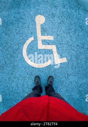 Reserved parking for vehicles of people with disabilities. First person point of view Stock Photo