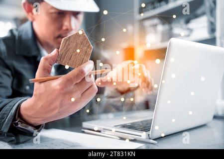 Engineer or Architect uses a laptop or technology for construction development Stock Photo