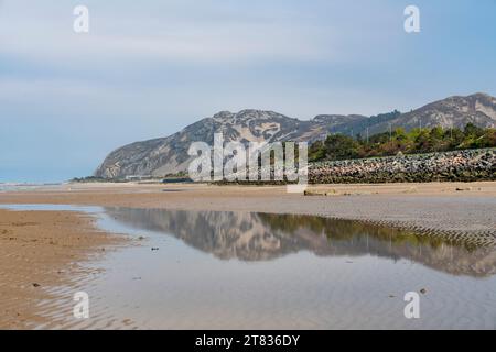 Penmaenmawr beach in Conwy County on the coast of North Wales. Stock Photo