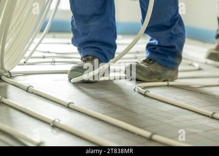installing  floor heating, modernization to save energy Stock Photo