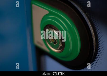 Tram exterior green door opening button, object detail, closeup, simple ...