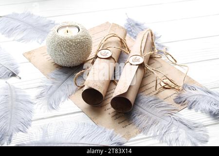 Ancient paper scrolls with wax seal stamps on white background Stock Photo