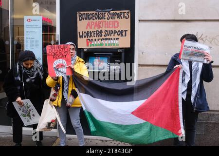 Oxford Street, London, UK. 18th Nov 2023. Palestinian protest outside an HSBC bank on Oxford Street, London. Credit: Alamy Live News Stock Photo