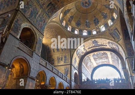 Facing West is a dome  of Holy Apostles’ of the Pentecost,  inside the huge medieval built central Knave at the Basilica di San Marco, (Saint Mark's B Stock Photo
