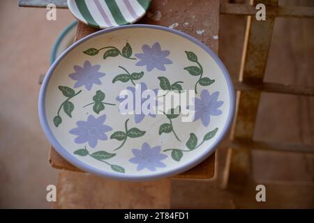 Hand Painted handmade pottery drying before final firing photographed ...