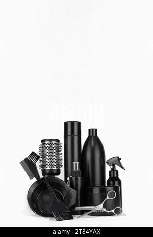 Professional items for a hairdressers, haircuts on a white background. Composition with scissors, other hairdresser's accessories on white background. Stock Photo