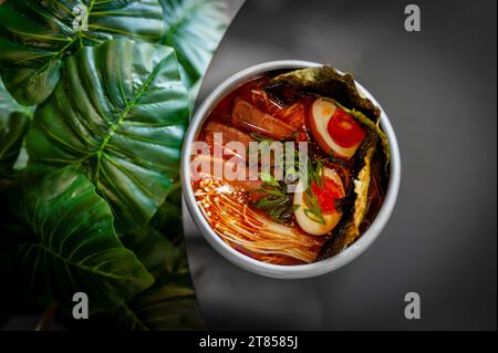 Miso Ramen Asian noodles soup with beef, egg and pak choi cabbage. Stock Photo
