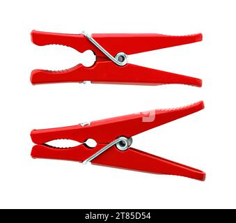 Red plastic clothespin on a white background. Stock Photo