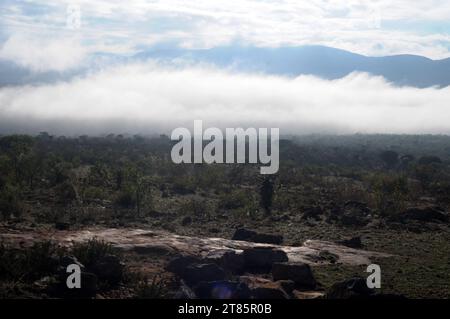 As the world battles climate change mist covers Maja village on the edges of the Drakensberg mountains in Limpopo, South Africa as weather patterns Stock Photo