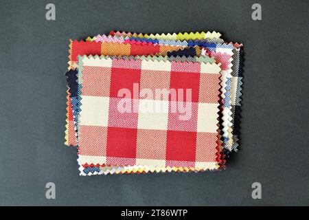 Checkered fabric pattern samples on black background Stock Photo