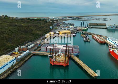 Portland, Dorset, UK.  18th November 2023.  General view from the air of the Bibby Stockholm asylum seekers barge at Portland Port near Weymouth in Dorset.  Picture Credit: Graham Hunt/Alamy Live News Stock Photo