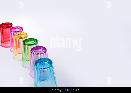 Colorful drinking glasses on white background Stock Photo