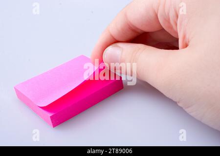 Post note office sticker for taking notes in hand Stock Photo