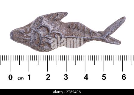 Ancient malaysian fish tin coin. Isolated on white Stock Photo