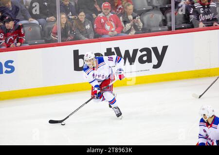 Newark, New Jersey, USA. 18th Nov, 2023. During the Eastern Conference game between the New Jersey Devils and the New York Rangers center VINCENT TROCHECK (16) takes the puck up ice towards the Devil's side in the first period at the Prudential Center in Newark, New Jersey (Credit Image: © Scott Rausenberger/ZUMA Press Wire) EDITORIAL USAGE ONLY! Not for Commercial USAGE! Stock Photo