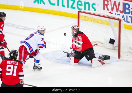 Newark, New Jersey, USA. 18th Nov, 2023. During the Eastern Conference game between the New Jersey Devils and the New York Rangers goalie VITEK VANECEK (41) blocks a shot on goal from left wing CHRIS KREIDER (20) in the second period at the Prudential Center in Newark, New Jersey (Credit Image: © Scott Rausenberger/ZUMA Press Wire) EDITORIAL USAGE ONLY! Not for Commercial USAGE! Stock Photo