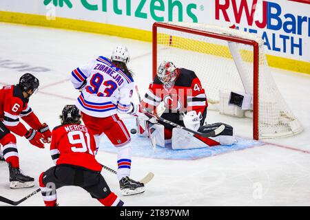 Newark, New Jersey, USA. 18th Nov, 2023. During the Eastern Conference game between the New Jersey Devils and the New York Rangers goalie VITEK VANECEK (41) blocks a shot on goal from center MIKA ZIBANEJAD (93) in the second period at the Prudential Center in Newark, New Jersey (Credit Image: © Scott Rausenberger/ZUMA Press Wire) EDITORIAL USAGE ONLY! Not for Commercial USAGE! Stock Photo