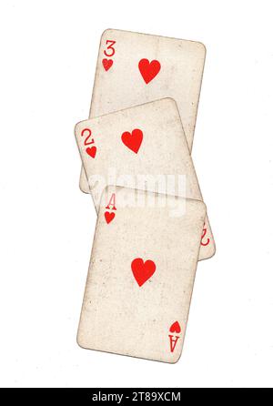 Vintage playing cards showing a run of ace, two and three of hearts on a white background. Stock Photo