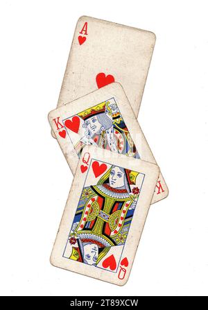 Vintage playing cards showing a run of queen, king and ace of hearts on a white background. Stock Photo