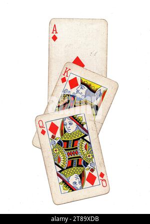 Vintage playing cards showing a run of queen, king and ace of diamonds on a white background. Stock Photo