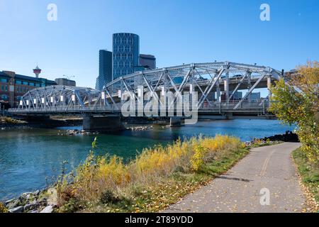 Calgary, Alberta, Canada - October 8 2023 : Reconciliation Bridge ( Langevin Bridge ) and Bow River Pathway. Downtown Calgary. Stock Photo