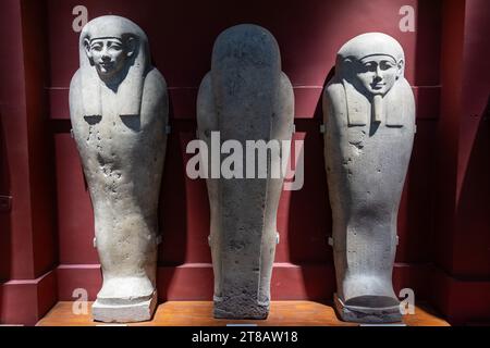 CAIRO, EGYPT - 02 SEP 02, 2023: three stone sarcophagi with a face in the Cairo Museum Stock Photo