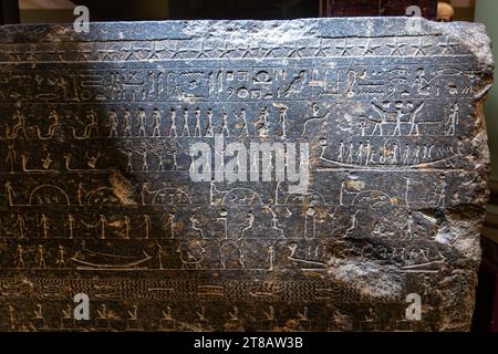 CAIRO, EGYPT - 02 SEP 02, 2023: drawings carved on the granite sarcophagus of ancient Egypt Stock Photo