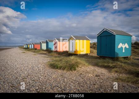 16.09.2023 Findhorn, Moray, Scotland, UK.  Bright coloured beach huts on Findhorn Beach Stock Photo