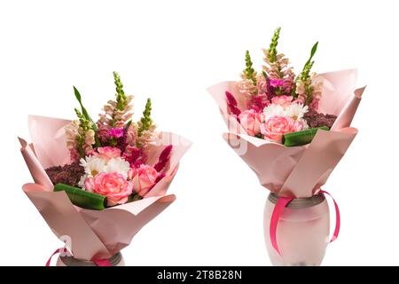 Bouquet of  soft pink flowers in pink wrapping paper. Isolated on a white background. Stock Photo