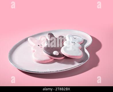 Cute and Delicious: Bunny Rabbit Cookies for Easter on Pink Background Stock Photo