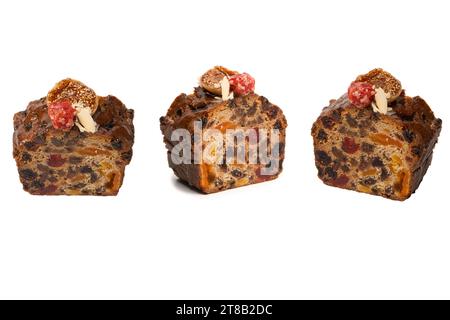 A cake with dried fruits, raisins almonds, dried strawberry, dried apricots. Stock Photo
